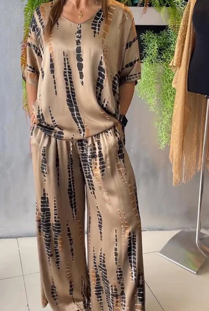 Two-piece satin casual suit with a round neckline