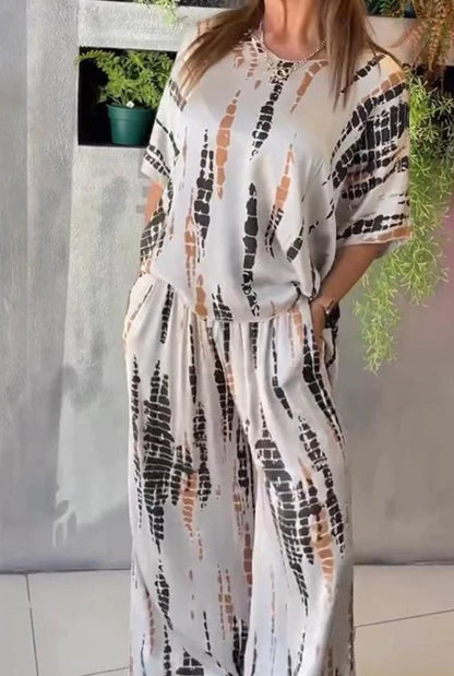Two-piece satin casual suit with a round neckline