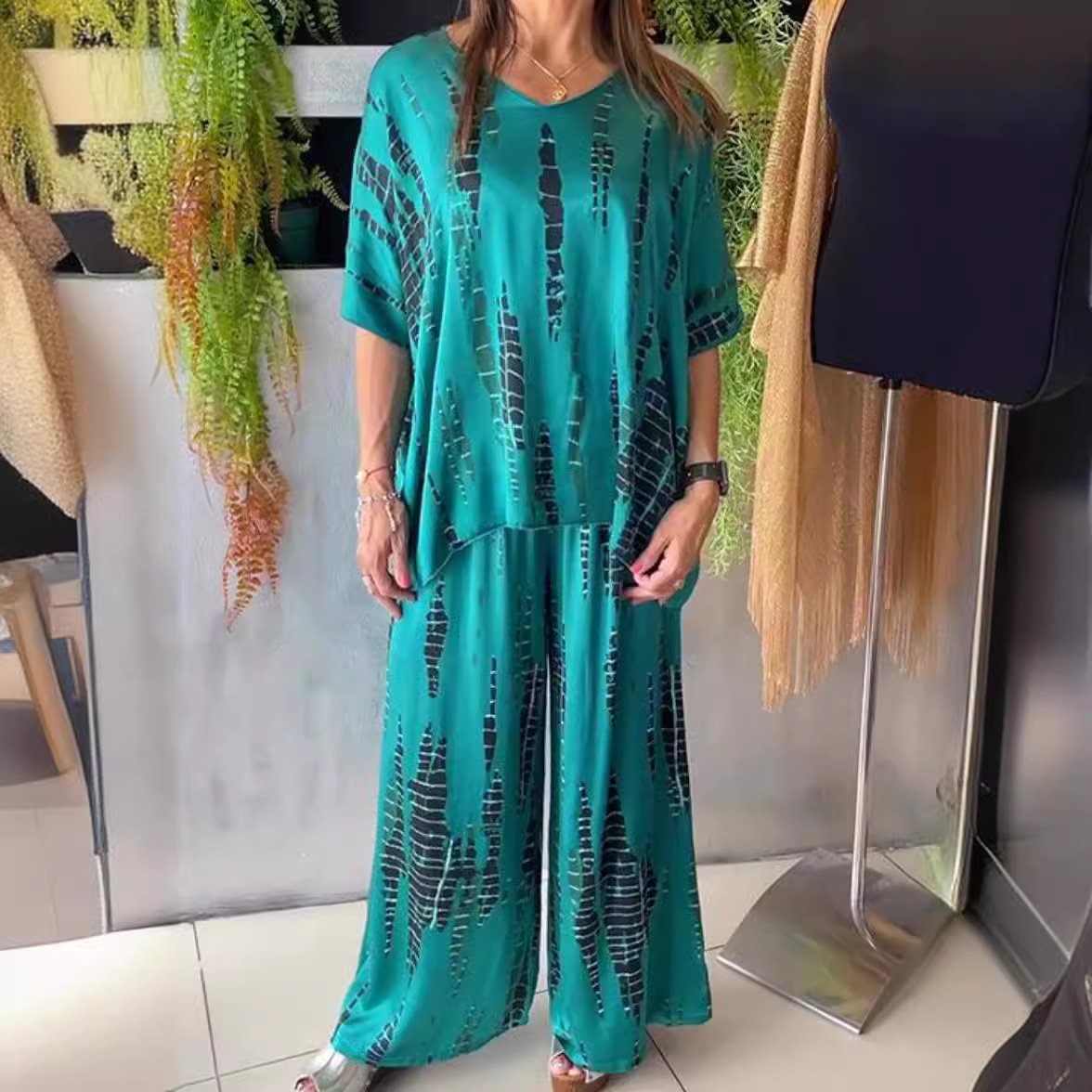 Two-piece satin casual suit with a round neckline